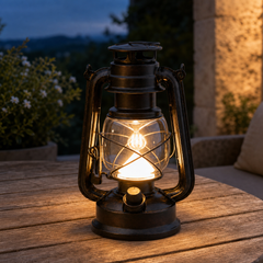 Haven Rechargeable Lantern styled on an outdoor table at dusk