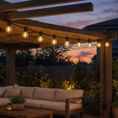 Celeste plug-in G40 string lights on patio pergola at dusk