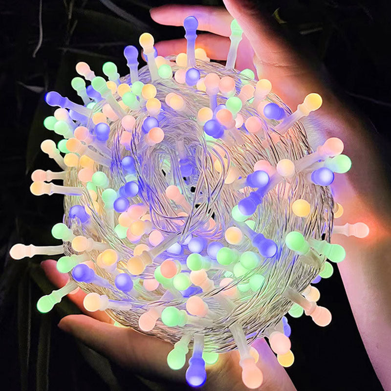 Multicolour Cherry Bead lights in a hand; supplier appearance reference, length and power unit not shown