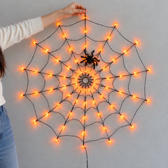Cobweb Glow LED Halloween Net Lights — in situ at night