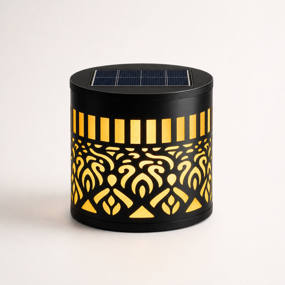 Solara LED Mandala Wall Light — solar-powered decorative wall light with cutout mandala pattern casting a warm patterned glow on an exterior wall